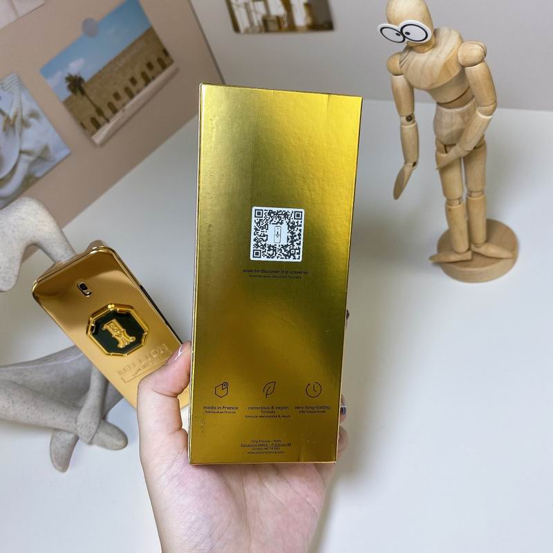 Paco Rabanne 1 Million Golden Oud bottle held in hand showing gold bar design